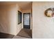 Condo entrance with frosted glass door at 12300 Vonn Rd # 6101, Largo, FL 33774