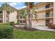 Condo building with courtyard and landscaping at 12300 Vonn Rd # 6101, Largo, FL 33774