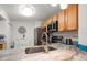 Condo kitchen sink and granite countertops at 12300 Vonn Rd # 6101, Largo, FL 33774