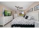 Spacious main bedroom with a large bed and dresser at 12300 Vonn Rd # 6101, Largo, FL 33774
