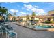 Community pool with plenty of lounge chairs at 12300 Vonn Rd # 6101, Largo, FL 33774