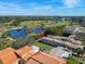 Aerial view of new construction home near golf course and pond at 126 Ricardo Ne Way, St Petersburg, FL 33704