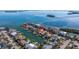 Aerial view of a waterfront home with private dock and canal access at 127 Sands Point Dr, Tierra Verde, FL 33715