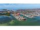 Bird's-eye view of waterfront home with private dock and canal access at 127 Sands Point Dr, Tierra Verde, FL 33715