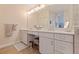 Elegant double vanity bathroom with modern finishes at 127 Sands Point Dr, Tierra Verde, FL 33715