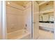 Clean bathroom with tile shower and bathtub at 127 Sands Point Dr, Tierra Verde, FL 33715