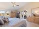Spacious main bedroom with water views and private balcony at 127 Sands Point Dr, Tierra Verde, FL 33715