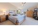 Large bedroom with a king-size bed, and plenty of natural light at 127 Sands Point Dr, Tierra Verde, FL 33715