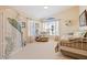 Bedroom with daybed and water views at 127 Sands Point Dr, Tierra Verde, FL 33715
