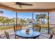 Covered deck overlooking the canal at 127 Sands Point Dr, Tierra Verde, FL 33715