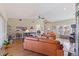 Living room with hardwood floors, high ceilings and access to other rooms at 127 Sands Point Dr, Tierra Verde, FL 33715