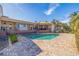 Spacious backyard oasis featuring a large pool and expansive deck at 127 Sands Point Dr, Tierra Verde, FL 33715