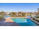 Inviting pool with brick patio and canal view at 127 Sands Point Dr, Tierra Verde, FL 33715