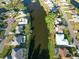 Aerial view showcasing a community with waterfront properties at 1290 Cambridge Dr, Venice, FL 34293