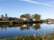 Stunning view of a peaceful canal with neighboring homes at 1290 Cambridge Dr, Venice, FL 34293