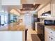 Modern kitchen with granite countertops and stainless steel appliances at 1290 Cambridge Dr, Venice, FL 34293