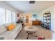 Open living space with a home office and comfy seating at 1290 Cambridge Dr, Venice, FL 34293
