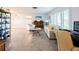 Spacious living room with light flooring and comfortable seating at 1290 Cambridge Dr, Venice, FL 34293