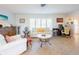Relaxing living room with a comfortable seating arrangement at 1290 Cambridge Dr, Venice, FL 34293