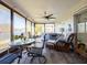 Relaxing screened porch overlooking a canal with a hot tub at 1290 Cambridge Dr, Venice, FL 34293