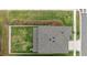 Top-down aerial view of a house with a gray roof and fenced backyard at 14786 Horse Trot Rd, Lithia, FL 33547