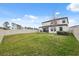 Spacious backyard with a grassy lawn at 14786 Horse Trot Rd, Lithia, FL 33547