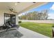 Spacious backyard with grassy area and privacy fence at 14786 Horse Trot Rd, Lithia, FL 33547