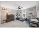 Cozy bedroom with dresser, daybed, and charming wall decor at 14786 Horse Trot Rd, Lithia, FL 33547
