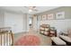 Bedroom with crib, rocker, and plenty of storage at 14786 Horse Trot Rd, Lithia, FL 33547