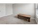 Spacious bedroom featuring gray carpeting and wood coffee table at 14786 Horse Trot Rd, Lithia, FL 33547