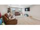 Convenient coat closet with bench seating and storage at 14786 Horse Trot Rd, Lithia, FL 33547