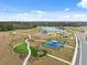Community park with playground, pickleball courts, and walking paths at 14786 Horse Trot Rd, Lithia, FL 33547