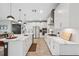 Spacious kitchen featuring white cabinets and stainless steel appliances at 14786 Horse Trot Rd, Lithia, FL 33547