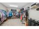 Large walk-in closet with ample shelving and hanging space at 14786 Horse Trot Rd, Lithia, FL 33547