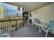 Private balcony with outdoor seating and water views at 1600 Gulf Blvd # 417, Clearwater Beach, FL 33767