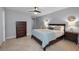 Bright bedroom with a comfortable bed and dresser at 1600 Gulf Blvd # 417, Clearwater Beach, FL 33767