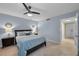 Bright bedroom with a king-size bed and ensuite bathroom access at 1600 Gulf Blvd # 417, Clearwater Beach, FL 33767