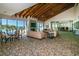 Spacious condo community room with ocean views, fireplace, and seating areas at 1600 Gulf Blvd # 417, Clearwater Beach, FL 33767