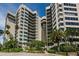 Elegant beachfront condo building with tropical landscaping at 1600 Gulf Blvd # 417, Clearwater Beach, FL 33767