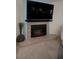 Modern gas fireplace with tile surround at 1600 Gulf Blvd # 417, Clearwater Beach, FL 33767