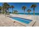 Oceanfront hot tub with palm trees at 1600 Gulf Blvd # 417, Clearwater Beach, FL 33767