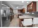 Modern kitchen with stainless steel appliances and a breakfast bar at 1600 Gulf Blvd # 417, Clearwater Beach, FL 33767