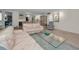 Spacious living area showcasing elegant furnishings and a view to the dining area at 1600 Gulf Blvd # 417, Clearwater Beach, FL 33767
