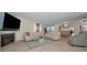 Open living space featuring a fireplace and ample natural light at 1600 Gulf Blvd # 417, Clearwater Beach, FL 33767