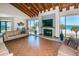 Community lounge with hardwood floors, fireplace, and ocean views at 1600 Gulf Blvd # 417, Clearwater Beach, FL 33767