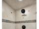 Modern shower with tile accents and new fixtures at 1600 Gulf Blvd # 417, Clearwater Beach, FL 33767