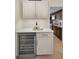 Wet bar with wine cooler and ample counter space at 1600 Gulf Blvd # 417, Clearwater Beach, FL 33767