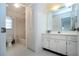 Clean bathroom with white vanity, tub and shower at 1613 Faxton Dr, Sun City Center, FL 33573
