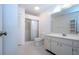 Bathroom with shower, toilet and double vanity at 1613 Faxton Dr, Sun City Center, FL 33573