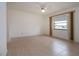 Large bedroom with tile flooring and window with view at 1613 Faxton Dr, Sun City Center, FL 33573